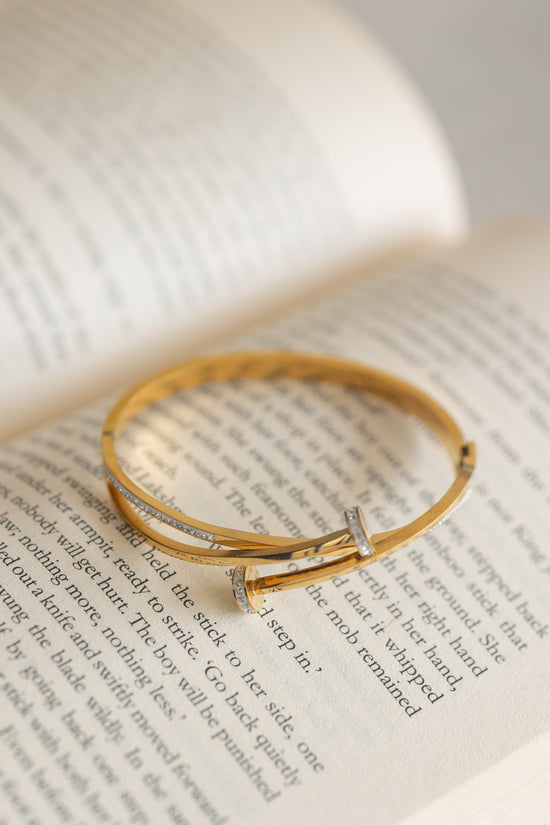 Twisted nail Gold tone bracelet