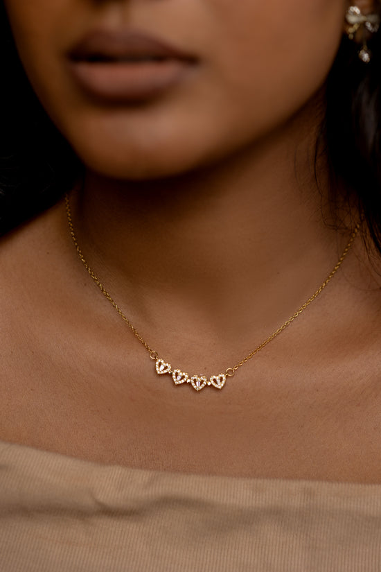 Row of White Stone Hearts Necklace