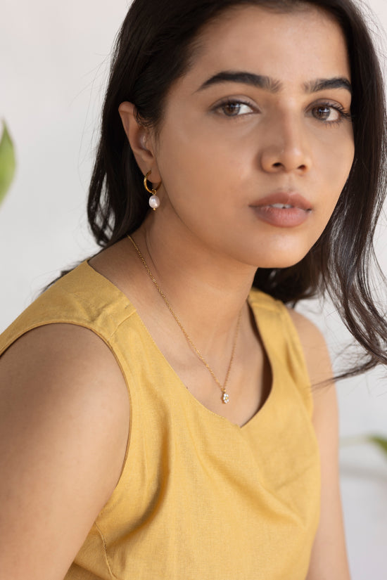 Small Hoop and a Pearl Drop Earring