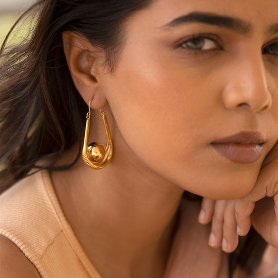 Swinging Ball Earring