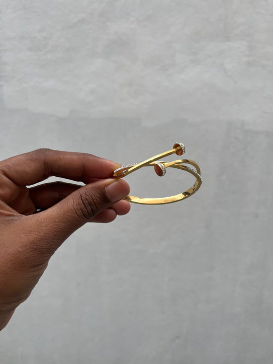 Twisted nail Rosegold tone bracelet