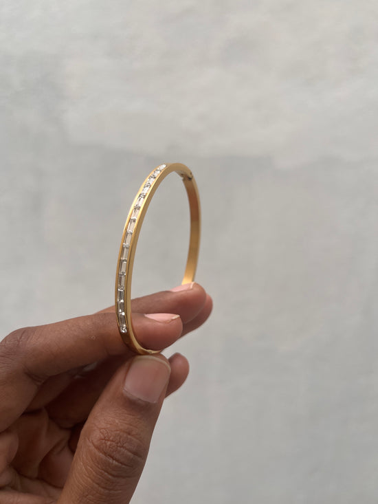 Long stone studded Gold Tone Bracelet