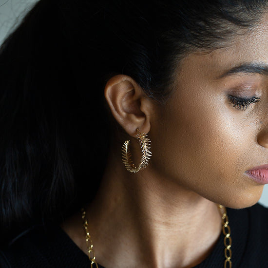 Themis (Curved Leaf Hoop Earrings Brass Tone )