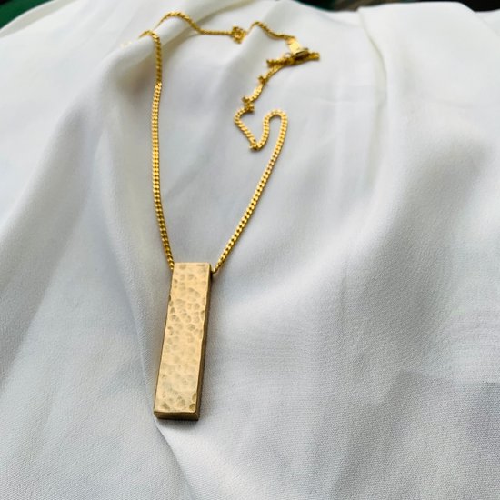 Solid Hammered Bar in a Gold plated chain