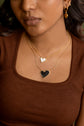 White enamel tilted heart necklace