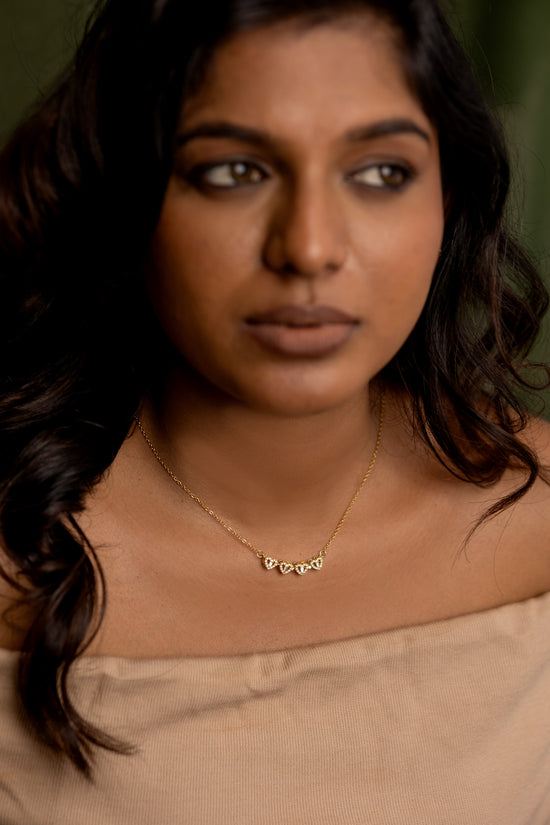 Row of White Stone Hearts Necklace