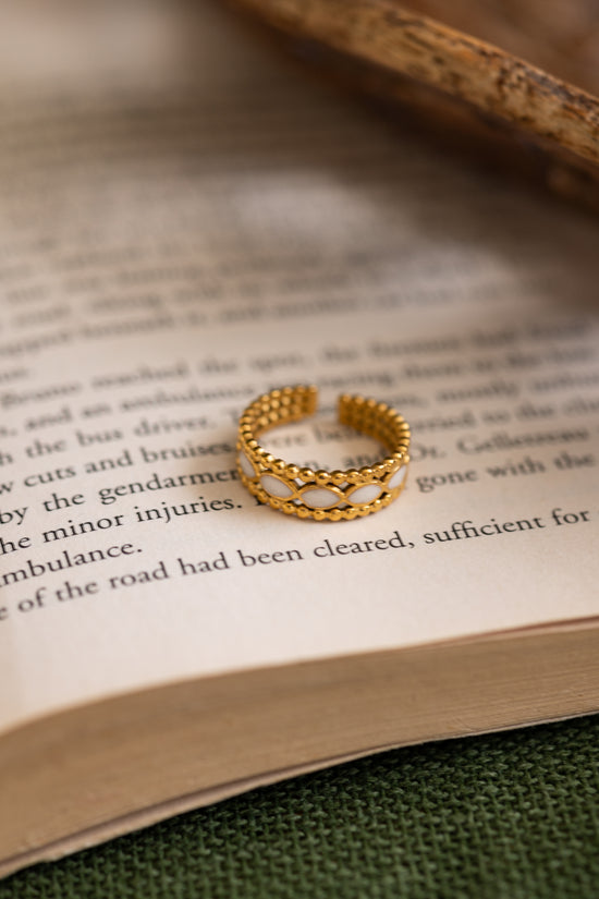 Row of White Eye Ring