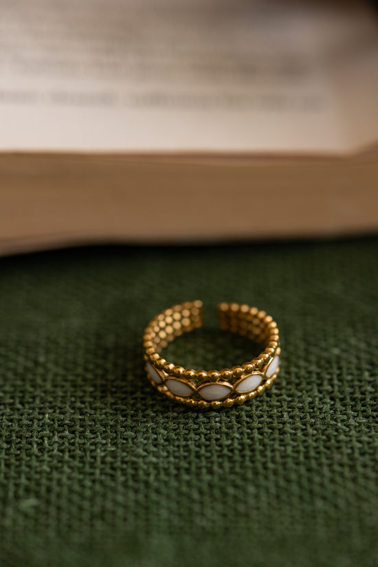 Row of White Eye Ring