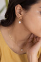 Small Hoop and a Pearl Drop Earring