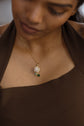 White Flower and Green Leaved Pendant Necklace