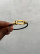 Black and Gold Loop Lock bracelet