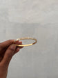 Long stone studded Gold Tone Bracelet