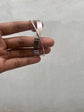 Crossed silver tone bracelet