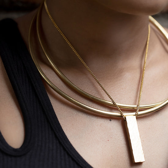 Solid Hammered Bar in a Gold plated chain